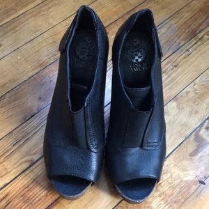 Vince Camuto leather peep toe platform booties.